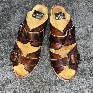 Gently used brown distressed Freebird shoes.